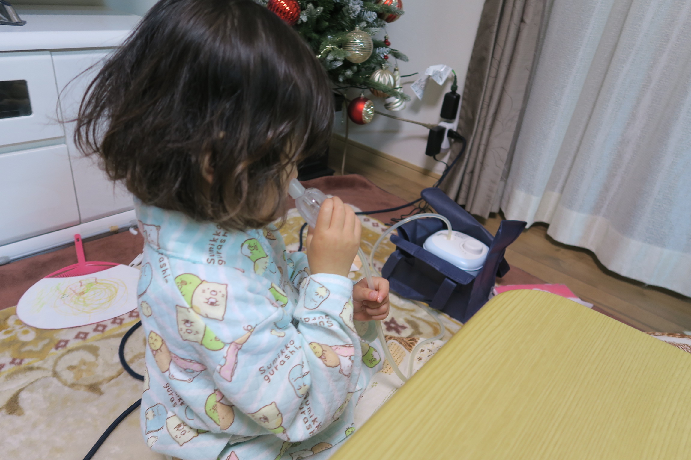 ピジョン電動鼻吸い器を使う３歳の子ども